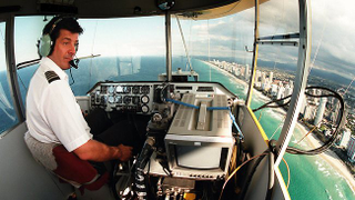 Illustration for article titled Goodyear blimp in fiery crash, pilot dies saving three (Video)